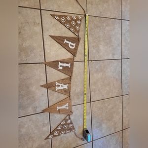 Play sign on twine string